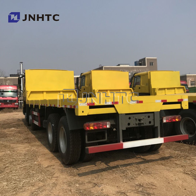 SINOTRUK 8 * 4 22-30 طن شاحنة نقل مسطحة مقعرة شاحنة نقل حفارة
