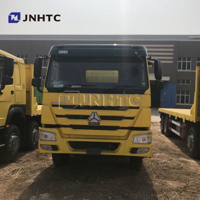 SINOTRUK 8 * 4 22-30 طن شاحنة نقل مسطحة مقعرة شاحنة نقل حفارة