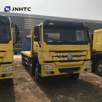 SINOTRUK 8 * 4 22-30 طن شاحنة نقل مسطحة مقعرة شاحنة نقل حفارة
